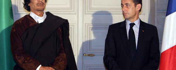 Libyan leader Col. Moammar Gadhafi, left, and French President Nicolas Sarkozy, pose during a signing ceremony at the Elysee Palace, Paris. (File) Libyan leader Col. Moammar Gadhafi, left, and French President Nicolas Sarkozy, pose during a signing ceremony at the Elysee Palace, Paris. (File) - Sputnik International