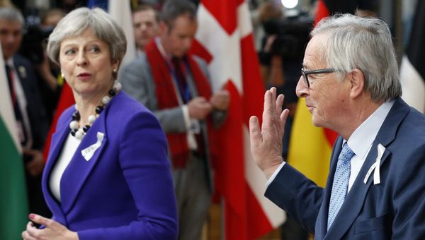 European Commission President Jean-Claude Juncker and Britain's Prime Minister Theresa May arrive at a European Union leaders summit in Brussels, Belgium, March 22, 2018. - Sputnik International