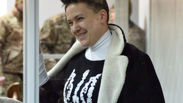 Verkhovna Rada deputy Nadezhda Savchenko, suspected of preparing terrorist attacks in central Kiev, during a hearing at the Shevchenkovsky District Court in Kiev - Sputnik International