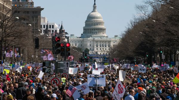 Participants in the March for Our Lives rally in Washignton requiring tightened control over the sales of fire weapons - Sputnik International