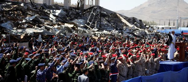 Army officers allied with the Houthis attend a rally at a parade square damaged by air strikes to mark the third anniversary of the Saudi-led intervention in the Yemeni conflict in Sanaa, Yemen March 26, 2018 Army officers allied with the Houthis attend a rally at a parade square damaged by air strikes to mark the third anniversary of the Saudi-led intervention in the Yemeni conflict in Sanaa, Yemen March 26, 2018 - Sputnik International