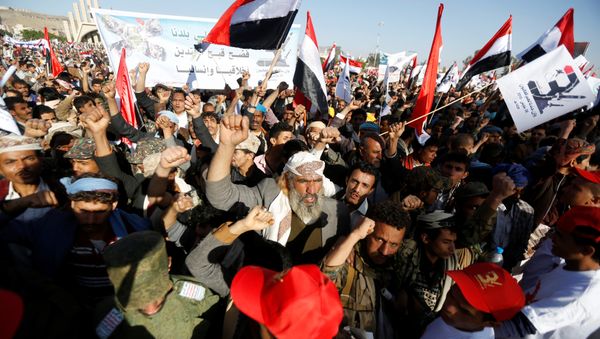 Houthi supporters attend a rally to mark the third anniversary of the Saudi-led intervention in the Yemeni conflict in Sanaa, Yemen March 26, 2018 - Sputnik International