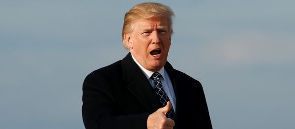 U.S. President Donald Trump gives thumbs-up as he returns from Palm Beach, Florida, at Joint Base Andrews in Maryland, U.S., March 25, 2018 U.S. President Donald Trump gives thumbs-up as he returns from Palm Beach, Florida, at Joint Base Andrews in Maryland, U.S., March 25, 2018 - Sputnik International