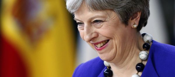 Britain's Prime Minister Theresa May smiles as she arrives at a European Union leaders summit in Brussels, Belgium, March 22, 2018 - Sputnik International