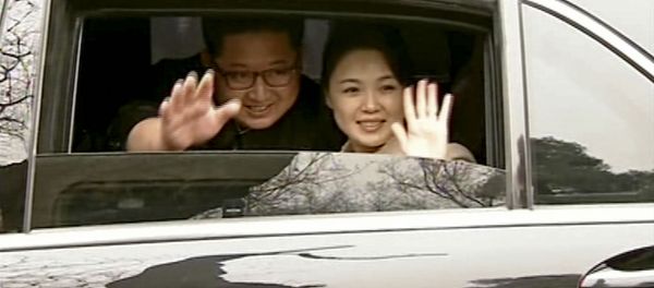 In this image taken from video footage run Wednesday, March 28, 2018, by China's CCTV via AP Video, North Korean leader Kim Jong Un, left, and his wife Ri Sol Ju wave from a car as they bid farewell to Chinese counterpart Xi Jinping and his wife Peng Liyuan in Beijing. North Korea's leader Kim and his Chinese counterpart Xi sought to portray strong ties between the neighbors and long-time allies despite a recent chill, as both countries on Wednesday confirmed Kim's secret trip to Beijing this week. In this image taken from video footage run Wednesday, March 28, 2018, by China's CCTV via AP Video, North Korean leader Kim Jong Un, left, and his wife Ri Sol Ju wave from a car as they bid farewell to Chinese counterpart Xi Jinping and his wife Peng Liyuan in Beijing. North Korea's leader Kim and his Chinese counterpart Xi sought to portray strong ties between the neighbors and long-time allies despite a recent chill, as both countries on Wednesday confirmed Kim's secret trip to Beijing this week. - Sputnik International
