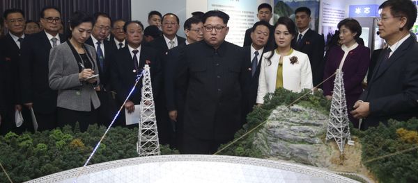 In this photo released Wednesday, March 28, 2018 by China's Xinhua News Agency, North Korean leader Kim Jong Un, center, and his wife Ri Sol Ju, visit an exhibition highlighting achievements by the Chinese Academy of Sciences. In this photo released Wednesday, March 28, 2018 by China's Xinhua News Agency, North Korean leader Kim Jong Un, center, and his wife Ri Sol Ju, visit an exhibition highlighting achievements by the Chinese Academy of Sciences. - Sputnik International