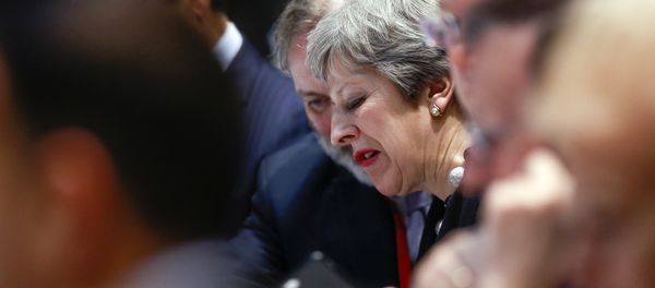 British Prime Minister Theresa May, center, attends a breakfast meeting at an EU summit in Brussels on Friday, March 23, 2018 - Sputnik International