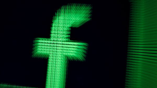 A 3D-printed Facebook logo are seen in front of displayed binary digits in this illustration taken, March 18, 2018 A 3D-printed Facebook logo are seen in front of displayed binary digits in this illustration taken, March 18, 2018 - Sputnik International