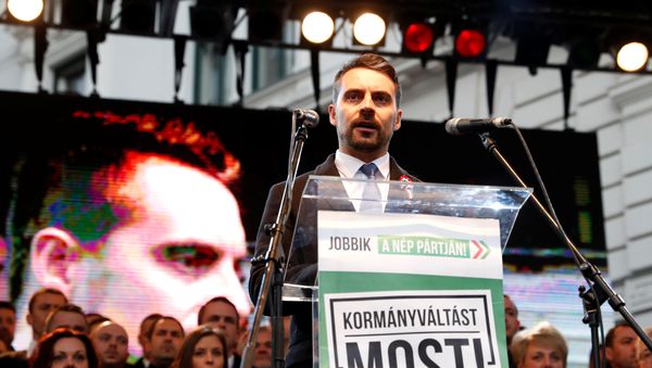 Chairman of the Hungarian right wing opposition party Jobbik Gabor Vona speaks at a rally during Hungary's National Day celebrations, which also commemorates the 1848 Hungarian Revolution against the Habsburg monarchy, in Budapest, Hungary March 15, 2018 Chairman of the Hungarian right wing opposition party Jobbik Gabor Vona speaks at a rally during Hungary's National Day celebrations, which also commemorates the 1848 Hungarian Revolution against the Habsburg monarchy, in Budapest, Hungary March 15, 2018 - Sputnik International