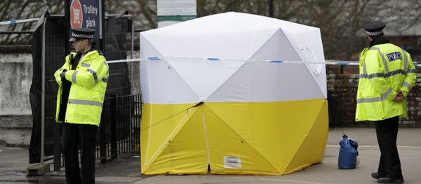 Police officers guard a cordon around a police tent covering a supermarket car park pay machine near the area where former Russian double agent Sergei Skripal and his daughter were found critically ill following exposure to the Russian-developed nerve agent Novichok in Salisbury, England, Tuesday, March 13, 2018 Police officers guard a cordon around a police tent covering a supermarket car park pay machine near the area where former Russian double agent Sergei Skripal and his daughter were found critically ill following exposure to the Russian-developed nerve agent Novichok in Salisbury, England, Tuesday, March 13, 2018 - Sputnik International