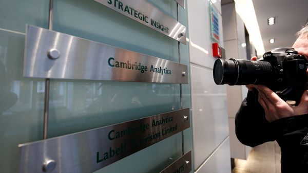 A photographer takes a photograph of the nameplate of political consultancy, Cambridge Analytica, in central London, Britain March 21, 2018 A photographer takes a photograph of the nameplate of political consultancy, Cambridge Analytica, in central London, Britain March 21, 2018 - Sputnik International