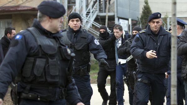 Kosovo police escort Marko Djuric a Serb official to a police station in Kosovo capital Pristina after he was arrested in northern Kosovo town of Mitrovica on Monday, March 26, 2018 Kosovo police escort Marko Djuric a Serb official to a police station in Kosovo capital Pristina after he was arrested in northern Kosovo town of Mitrovica on Monday, March 26, 2018 - Sputnik International