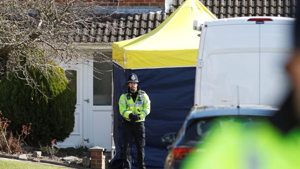 A police officer stands guard outside of the home of former Russian military intelligence officer Sergei Skripal, in Salisbury, Britain A police officer stands guard outside of the home of former Russian military intelligence officer Sergei Skripal, in Salisbury, Britain - Sputnik International