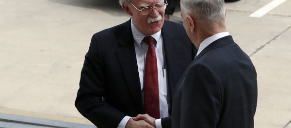 President Donald Trump's pick for national security adviser John Bolton, left, shakes hands with Defense Secretary Jim Mattis, as Bolton arrives at the Pentagon, Thursday, March 29, 2018, in Washington. President Donald Trump's pick for national security adviser John Bolton, left, shakes hands with Defense Secretary Jim Mattis, as Bolton arrives at the Pentagon, Thursday, March 29, 2018, in Washington. - Sputnik International