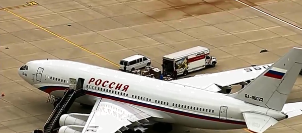 A Rossiya Ilyushin Il-96-300 picking up expelled Russian diplomats at Dulles International Airport near Washington, DC - Sputnik International