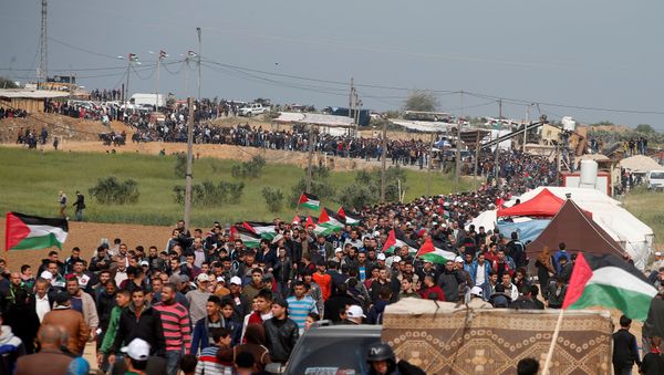 Palestinians attend a tent city protest along the Israel border with Gaza, demanding the right to return to their homeland, east of Gaza City Palestinians attend a tent city protest along the Israel border with Gaza, demanding the right to return to their homeland, east of Gaza City - Sputnik International