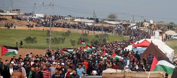 Palestinians attend a tent city protest along the Israel border with Gaza, demanding the right to return to their homeland, east of Gaza City Palestinians attend a tent city protest along the Israel border with Gaza, demanding the right to return to their homeland, east of Gaza City - Sputnik International