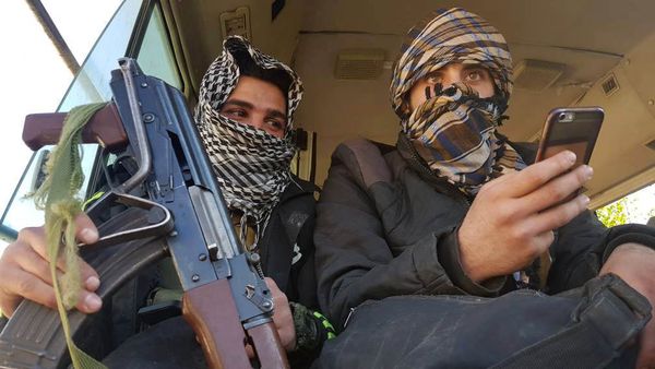 Rebels are seen in a bus as they are evacuated from the town of Douma, eastern Ghouta, in Damascus, Syria April 1, 2018 - Sputnik International