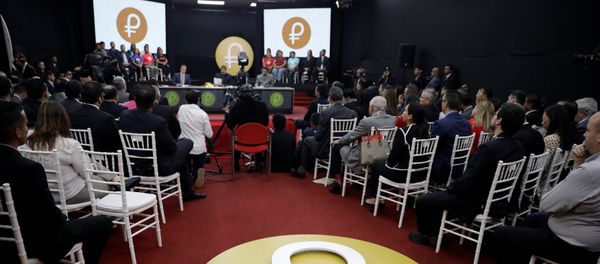 The Venezuelan cryptocurrency Petro logo is seen as Venezuela's President Nicolas Maduro speaks during a meeting with the ministers responsible for the economic sector at Miraflores Palace in Caracas, Venezuela March 22, 2018 - Sputnik International