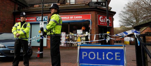 In this file photo taken on March 12, 2018 Police officers stand on duty at a cordon near a bench covered in a protective tent (R) at The Maltings shopping centre in Salisbury, southern England, on where former Russian spy Sergei Skripal and his daughter Yulia were found critically ill on a bench on March 4 and taken to hospital sparking a major incident In this file photo taken on March 12, 2018 Police officers stand on duty at a cordon near a bench covered in a protective tent (R) at The Maltings shopping centre in Salisbury, southern England, on where former Russian spy Sergei Skripal and his daughter Yulia were found critically ill on a bench on March 4 and taken to hospital sparking a major incident - Sputnik International