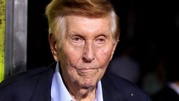 FILE - In this Oct. 1, 2012, file photo, Sumner Redstone attends the premiere of Seven Psychopaths in Los Angeles. On Thursday, Sept. 29, 2016, Redstone's firm, National Amusements, the company that controls CBS and Viacom, announced it wants the two media companies to combine again, more than a decade after they went their separate ways. CBS Corp. produces TV shows and owns its namesake network. Viacom Inc. owns cable channels MTV, Nickelodeon and VH1. - Sputnik International