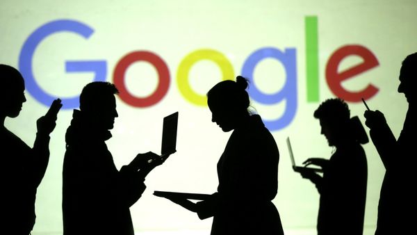 Silhouettes of laptop and mobile device users are seen next to a screen projection of Google logo in this picture illustration taken March 28, 2018 Silhouettes of laptop and mobile device users are seen next to a screen projection of Google logo in this picture illustration taken March 28, 2018 - Sputnik International