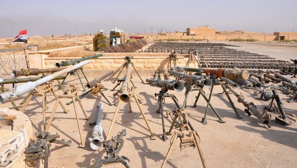 (File) A picture taken on November 5, 2017, shows weapons reportedly seized by Syrian government forces during a military operation against Islamic State (IS) group jihadists in the eastern city of Deir Ezzor - Sputnik International