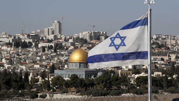 The Israeli flag flutters in front of the Dome of the Rock mosque and the city of Jerusalem, on December 1, 2017 - Sputnik International