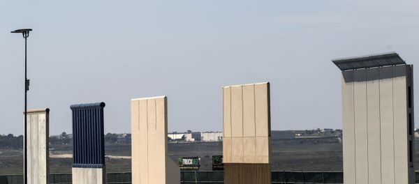 A US border patrol quad is seen next to US President Donald Trump's border wall prototypes from Tijuana, northwestern Mexico A US border patrol quad is seen next to US President Donald Trump's border wall prototypes from Tijuana, northwestern Mexico - Sputnik International