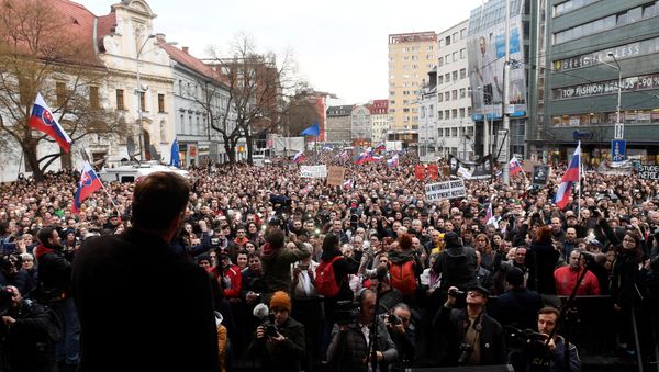 People attend a protest rally in reaction to the murder of Slovak investigative reporter Jan Kuciak and his fiancee Martina Kusnirova, in Bratislava, Slovakia April 5, 2018 People attend a protest rally in reaction to the murder of Slovak investigative reporter Jan Kuciak and his fiancee Martina Kusnirova, in Bratislava, Slovakia April 5, 2018 - Sputnik International