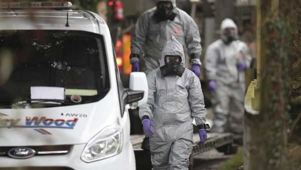 Investigators in protective clothing remove a van from an address in Winterslow, Wiltshire, as part of their investigation into the nerve-agent poisoning of ex-spy Sergei Skripal and his daughter, in England, Monday, March 12, 2018 Investigators in protective clothing remove a van from an address in Winterslow, Wiltshire, as part of their investigation into the nerve-agent poisoning of ex-spy Sergei Skripal and his daughter, in England, Monday, March 12, 2018 - Sputnik International