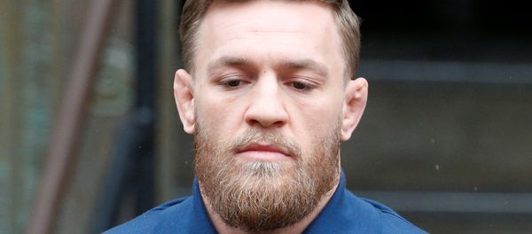 Mixed Martial Arts fighter Conor McGregor is escorted by New York City Police (NYPD) detectives from the 78th police precinct after charges were laid against him in the Brooklyn borough of New York City, U.S., April 6, 2018 Mixed Martial Arts fighter Conor McGregor is escorted by New York City Police (NYPD) detectives from the 78th police precinct after charges were laid against him in the Brooklyn borough of New York City, U.S., April 6, 2018 - Sputnik International