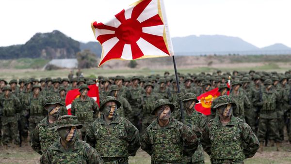 Soldiers of Japanese Ground Self-Defense Force (JGSDF)'s Amphibious Rapid Deployment Brigade, Japan's first marine unit since World War Two, gather at a ceremony activating the brigade at JGSDF's Camp Ainoura in Sasebo, on the southwest island of Kyushu, Japan April 7, 2018 - Sputnik International