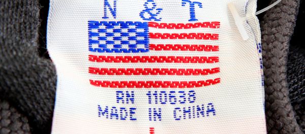 The label of a Washington D.C. sweatshirt bears a U.S. flag but says Made in China at a souvenir stand in Washington, DC, U.S., January 14, 2011 The label of a Washington D.C. sweatshirt bears a U.S. flag but says Made in China at a souvenir stand in Washington, DC, U.S., January 14, 2011 - Sputnik International
