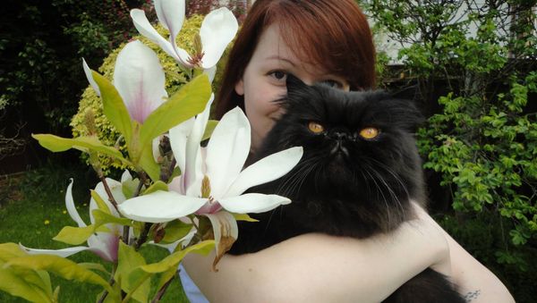 Yulia Skripal poses with a cat. File photo - Sputnik International