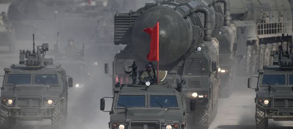 Tigr armored vehicles and a Yars land-based mobile missile system during a Victory Day Military Parade rehearsal at the Alabino military training ground in the Moscow Region - Sputnik International