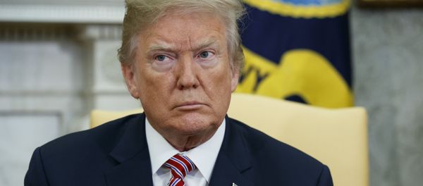 President Donald Trump listens during a meeting with the Emir of Qatar Sheikh Tamim bin Hamad al-Thani in the Oval Office of the White House, Tuesday, April 10, 2018, in Washington President Donald Trump listens during a meeting with the Emir of Qatar Sheikh Tamim bin Hamad al-Thani in the Oval Office of the White House, Tuesday, April 10, 2018, in Washington - Sputnik International