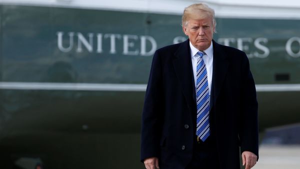 U.S. President Donald Trump walks to Air Force One as he departs for Palm Beach, Florida, from Joint Base Andrews in Maryland, U.S - Sputnik International