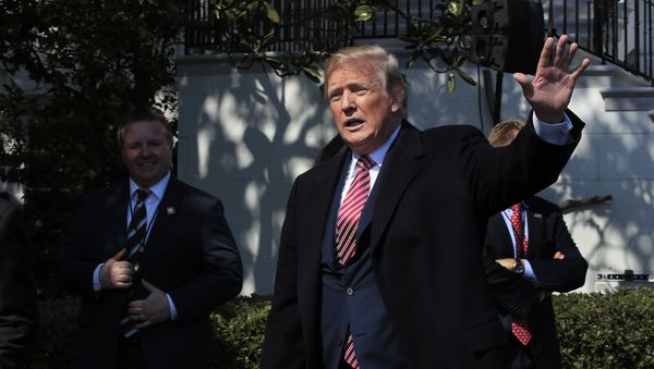 President Donald Trump waves as he leaves South Lawn following a ceremony to honor the 2017 NCAA football national champion, the Alabama Crimson Tide at the White House in Washington, Tuesday, April 10, 2018 President Donald Trump waves as he leaves South Lawn following a ceremony to honor the 2017 NCAA football national champion, the Alabama Crimson Tide at the White House in Washington, Tuesday, April 10, 2018 - Sputnik International