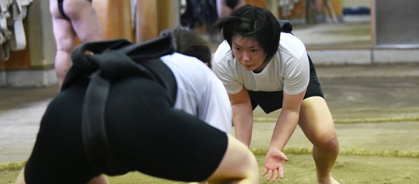 In a photograph taken on January 25, 2015, female sumo wrestler Sayaka Matsuo (R) fights with her teammate Shiori Kanehira (L) during a training session at Nihon University's sumo club in Tokyo In a photograph taken on January 25, 2015, female sumo wrestler Sayaka Matsuo (R) fights with her teammate Shiori Kanehira (L) during a training session at Nihon University's sumo club in Tokyo - Sputnik International