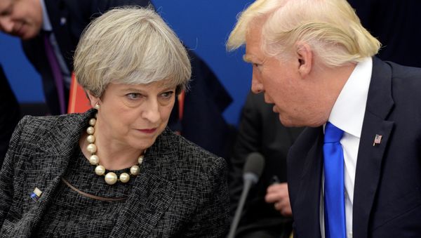 US President Donald Trump, right, speaks to British Prime Minister Theresa May in a working dinner meeting during the NATO summit of heads of state and government at the NATO headquarters, in Brussels on Thursday, May 25, 2017. US President Donald Trump, right, speaks to British Prime Minister Theresa May in a working dinner meeting during the NATO summit of heads of state and government at the NATO headquarters, in Brussels on Thursday, May 25, 2017. - Sputnik International