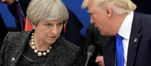 US President Donald Trump, right, speaks to British Prime Minister Theresa May in a working dinner meeting during the NATO summit of heads of state and government at the NATO headquarters, in Brussels on Thursday, May 25, 2017. US President Donald Trump, right, speaks to British Prime Minister Theresa May in a working dinner meeting during the NATO summit of heads of state and government at the NATO headquarters, in Brussels on Thursday, May 25, 2017. - Sputnik International