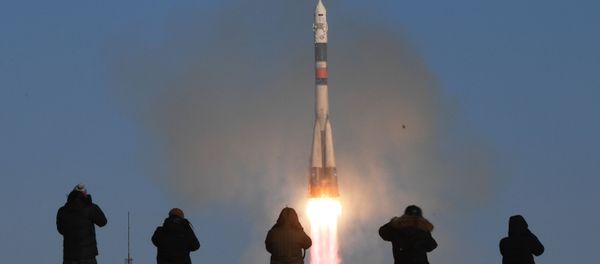 A Soyuz-FG rocket launches the Soyuz-MS-07 manned spacecraft from the Baikonur Space Center - Sputnik International