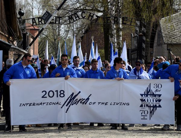 Participants open the March of the Living, a yearly Holocaust remembrance march between the former death camps of Auschwitz and Birkenau in Oswiecim - Sputnik International