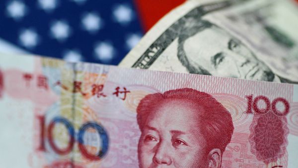 U.S. Dollar and China Yuan notes are seen in this picture illustration June 2, 2017 - Sputnik International