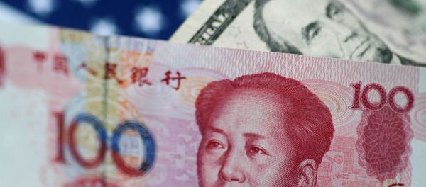 U.S. Dollar and China Yuan notes are seen in this picture illustration June 2, 2017 U.S. Dollar and China Yuan notes are seen in this picture illustration June 2, 2017 - Sputnik International