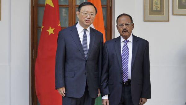 Indian National Security Adviser Ajit Doval, right, poses with Chinese State Councillor Yang Jiechi for photos before their meeting in New Delhi, India. (File) Indian National Security Adviser Ajit Doval, right, poses with Chinese State Councillor Yang Jiechi for photos before their meeting in New Delhi, India. (File) - Sputnik International
