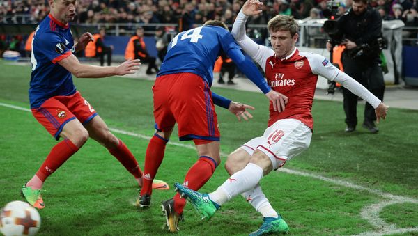 CSKA's Vasily Berezutsky, Kirill Nababkin and Arsenal's Nacho Monreal, left to right, during a quarterfinal match of the 2017/18 UEFA Europa League between CSKA (Moscow, Russia) and Arsenal (London, UK) CSKA's Vasily Berezutsky, Kirill Nababkin and Arsenal's Nacho Monreal, left to right, during a quarterfinal match of the 2017/18 UEFA Europa League between CSKA (Moscow, Russia) and Arsenal (London, UK) - Sputnik International