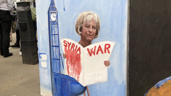 Live from Downing Street, London where crowds protest against Britain and the US launching military strikes in Syria. - Sputnik International