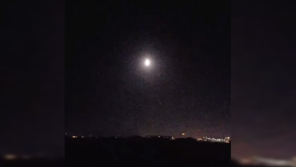 A missile seen flying over Damascus, Syria as US President Donald Trump announced his decision to bomb the country April 13. - Sputnik International